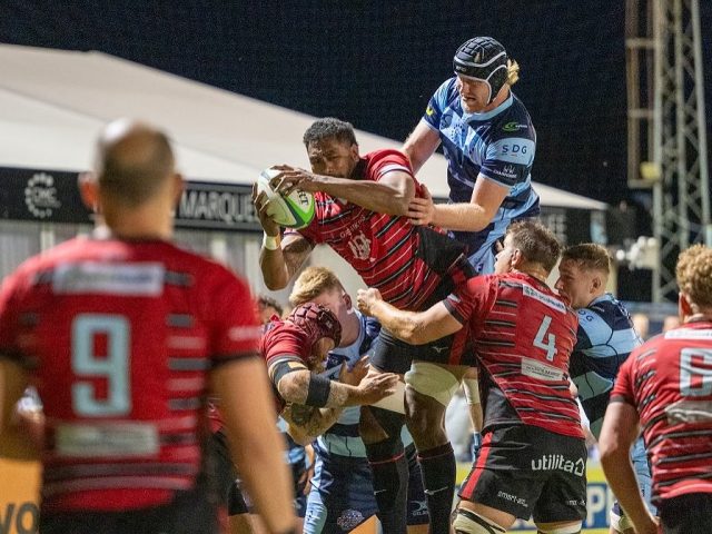 Luke Frost of Bedford Blues challenges for the ball amongst a number of Blackheath players