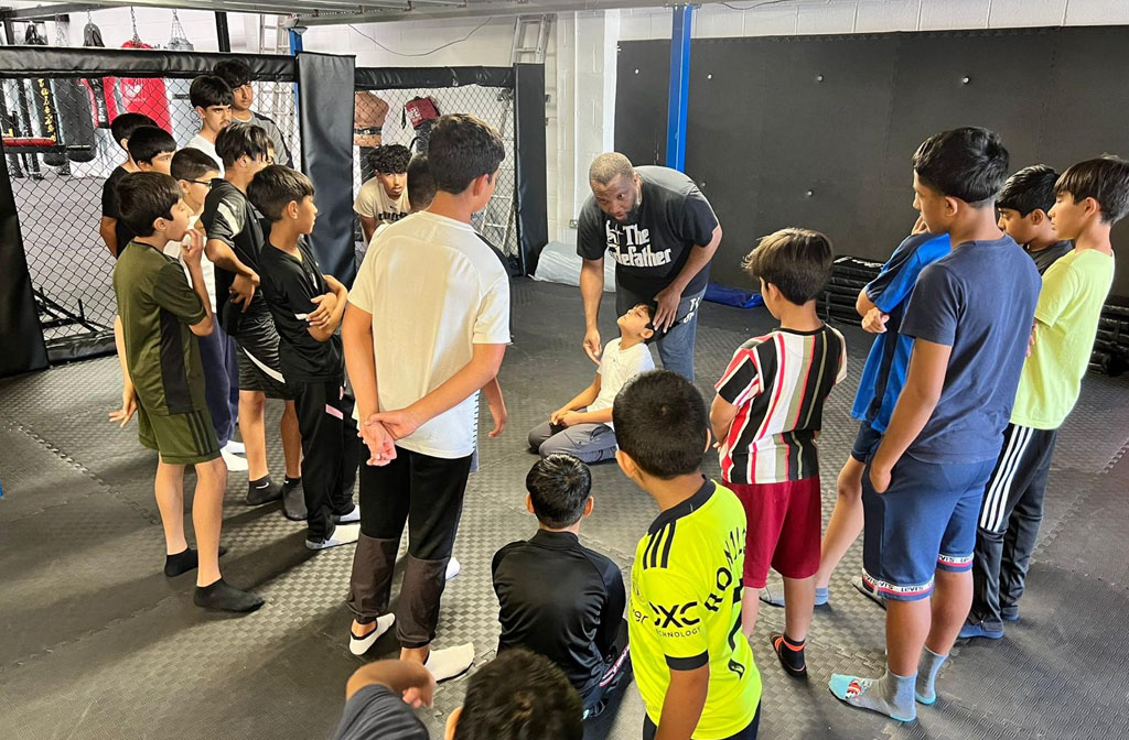 Young people at a martial arts class run by Samsons Academy