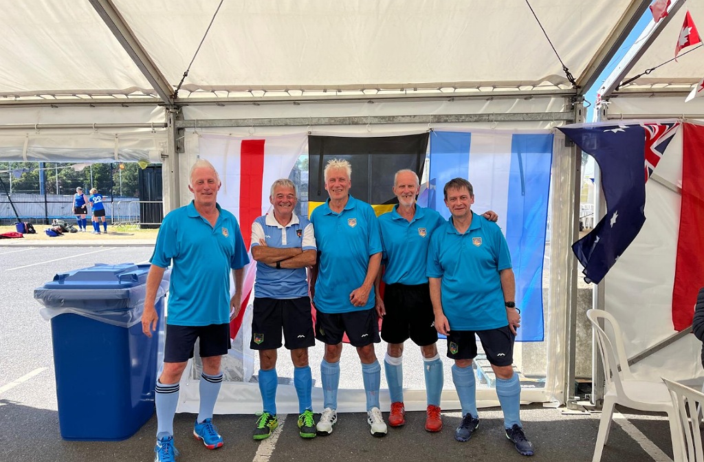 Five Bedford Hockey Club members at the International Grand Masters Hockey Festival