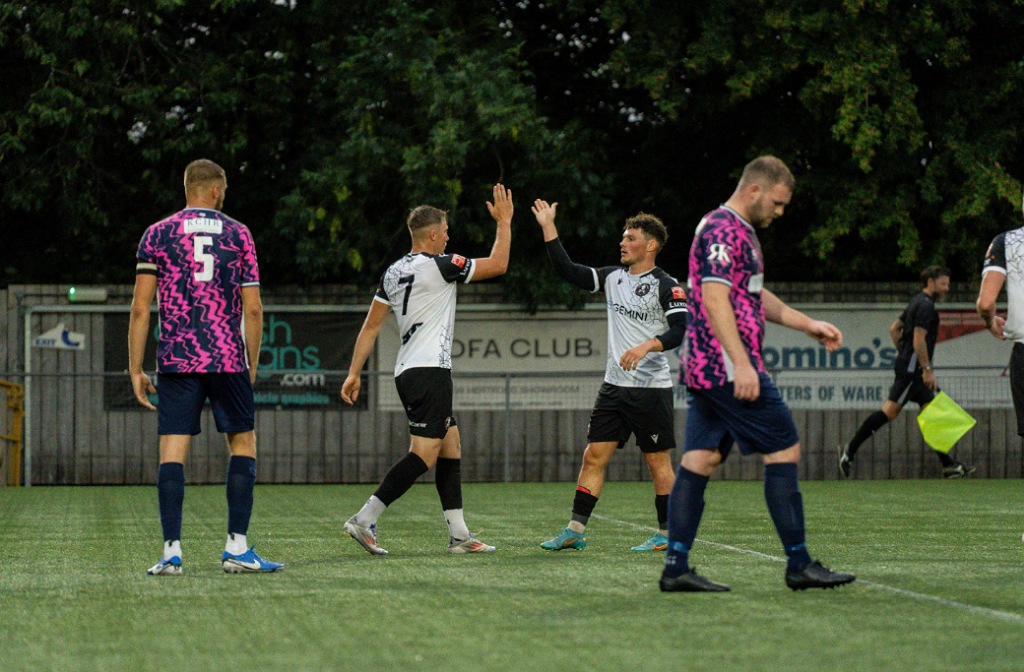 Two Real Bedford players celebrate a goal at a pre-season friendly at AFC Welwyn July 2025