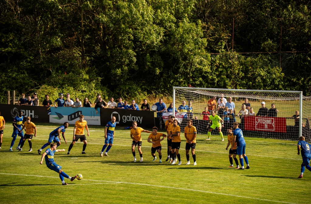 Real Bedford defend a dangerous free kick against Spalding United in August 2025