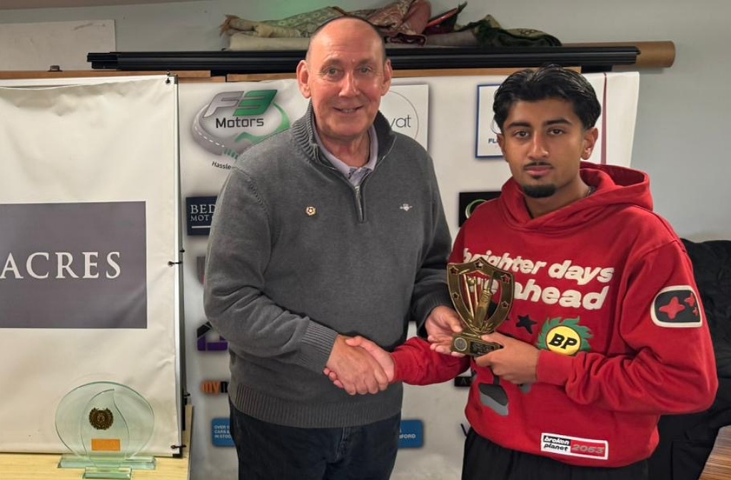 Mohammed Ali picking up his award from Martin Darlow Image: Aamir Younis / Queens Park Westfield Cricket Club