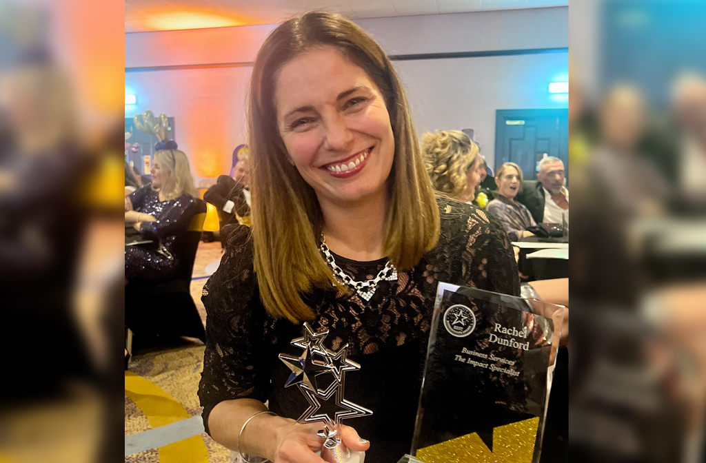 Award winning businesswoman Rachel Dunford holding her gold and silver awards