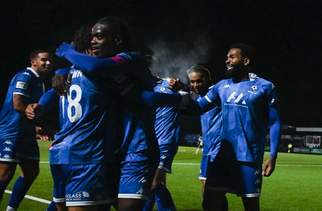 Ellis Brown celebrates a goal against Darlington at The Eyrie with his teammates