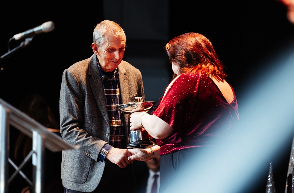 Howard Darbon collects his Service to Sport Award from Cllr Sarah Gallagher at the 2025 edition of the Bedford Sports Awards